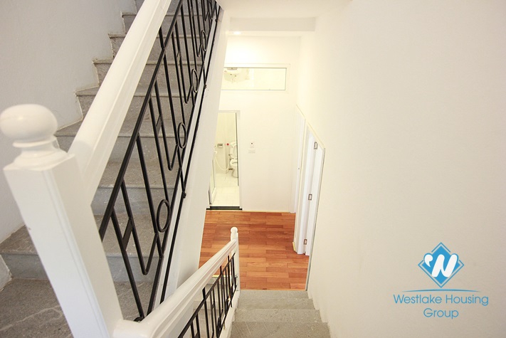 White house with 3 floor for rent in Tay Ho area 