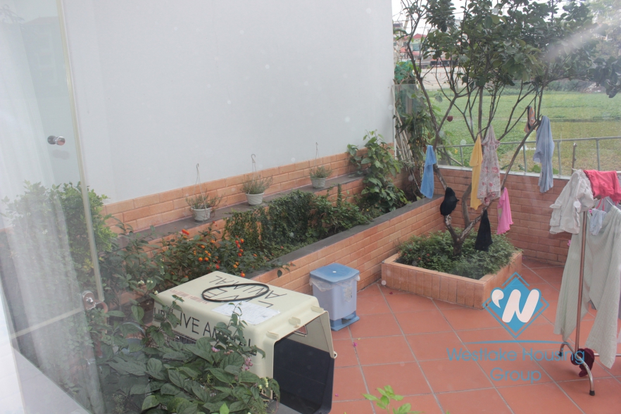 Beautiful apartment with nice garden for rent in Xuan Dieu Street, Tay Ho, Ha Noi 