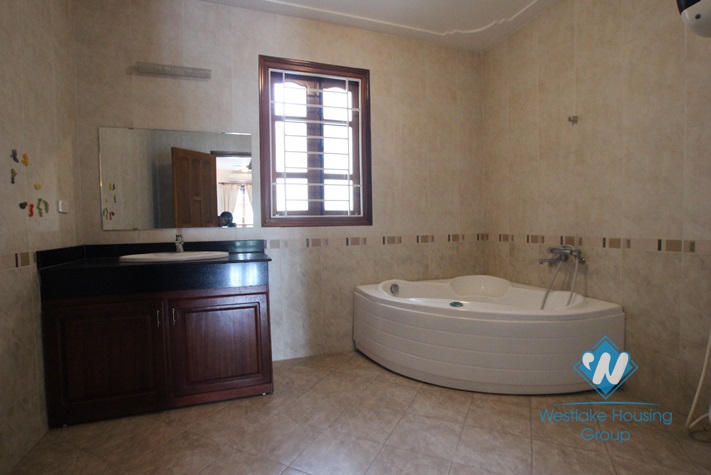 Beautiful house with big courtyard and swimming pool for rent in Xuan Dieu Street, Tay Ho District, Ha Noi