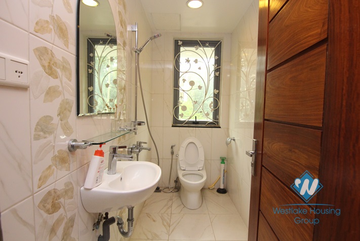 5 storey modern Tay Ho villa for rent with a car garage and elevator