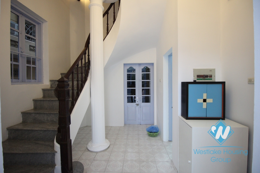 Charming house with nice yard for rent in Tay Ho area.