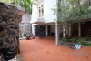 L-shaped modern house with swimming pool in Au Co street