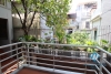 L-shaped modern house with swimming pool in Au Co street