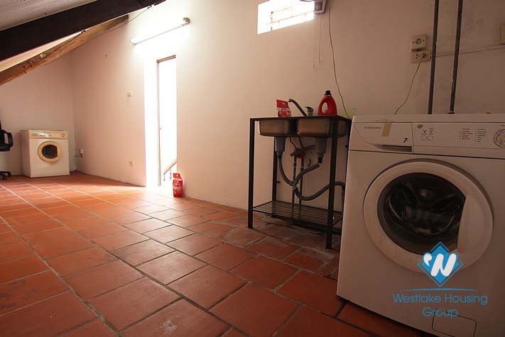 Nice house with small yard for rent in To Ngoc Van st, Tay Ho, Ha Noi