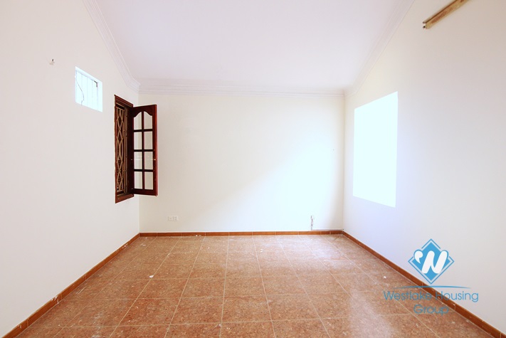 Unfurnished house for rent in Truc Bach area.