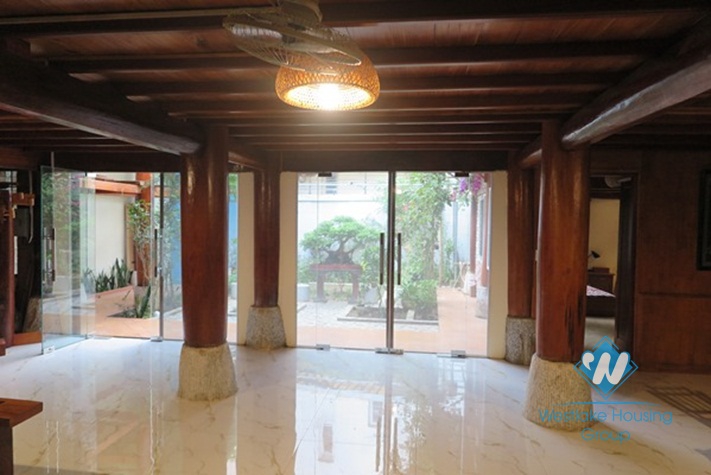 A unique- style house beautiful large garden for rent in Ba Dinh district