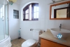 Unfurnished 4 bedrooms house with yard and garage for rent in Au Co st, Tay Ho area.