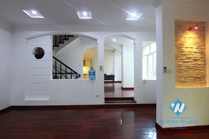 Unfurnished 4 bedrooms house with yard and garage for rent in Au Co st, Tay Ho area.