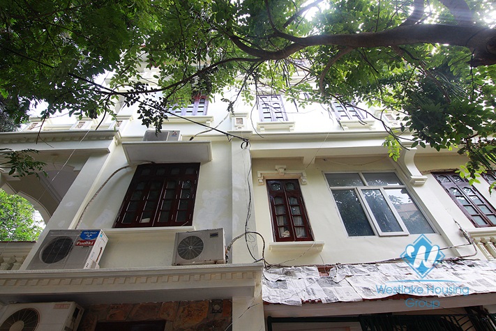 Unfurnished 4 bedrooms house with yard and garage for rent in Au Co st, Tay Ho area.