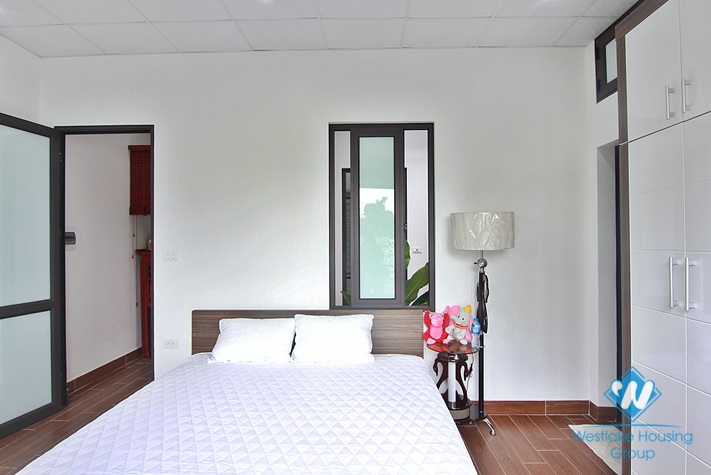 Green house with big yard for rent in An Duong, Tay Ho area