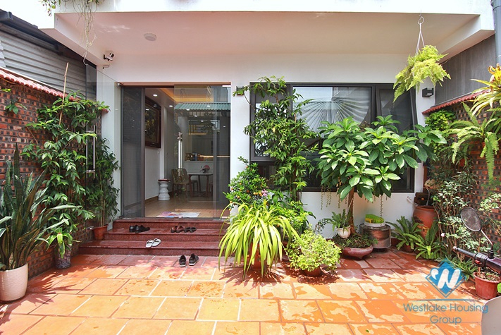 Green house with big yard for rent in An Duong, Tay Ho area