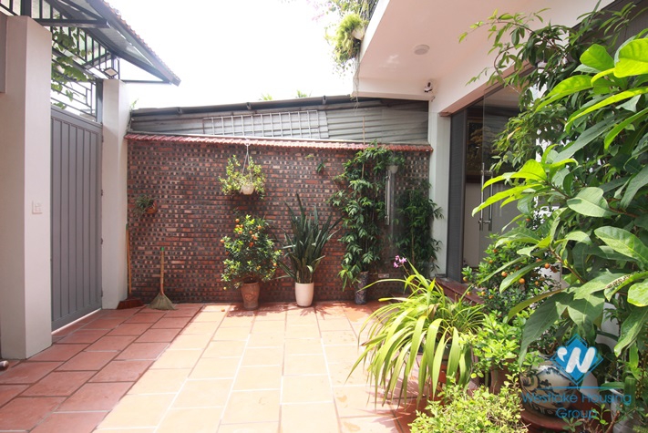 Green house with big yard for rent in An Duong, Tay Ho area