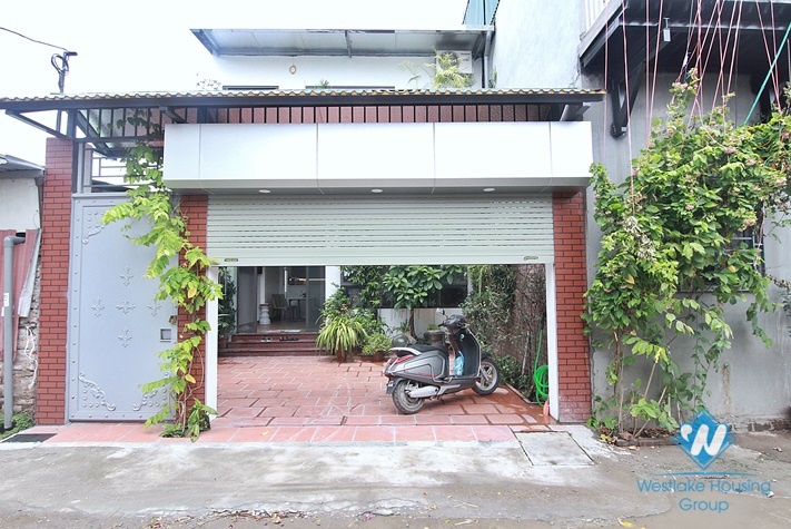 Green house with big yard for rent in An Duong, Tay Ho area