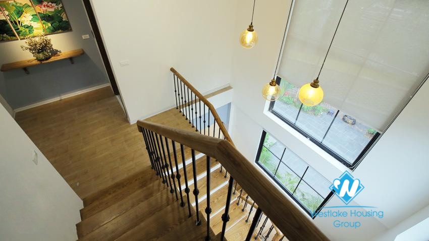 House for rent with four bedrooms and yard around the house in An Duong Vuong, Tay Ho