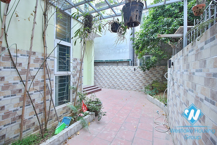 Unfurnished 3 beds house with big yard for rent in Lac Long Quan st, Tay Ho