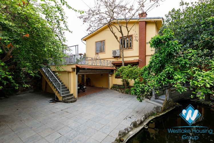 A Nice House with Feng Shui garden for rent in Au Co, Tay Ho