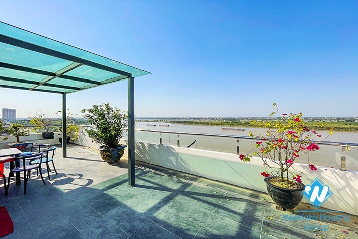 A brand new duplex in An Duong Vuong with river view for rent 