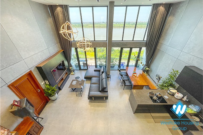 A brand new duplex in An Duong Vuong with river view for rent 