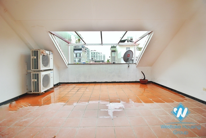Semi-furnished 4 bedrooms house with big yard for rent in Tay Ho ward, Ha Noi