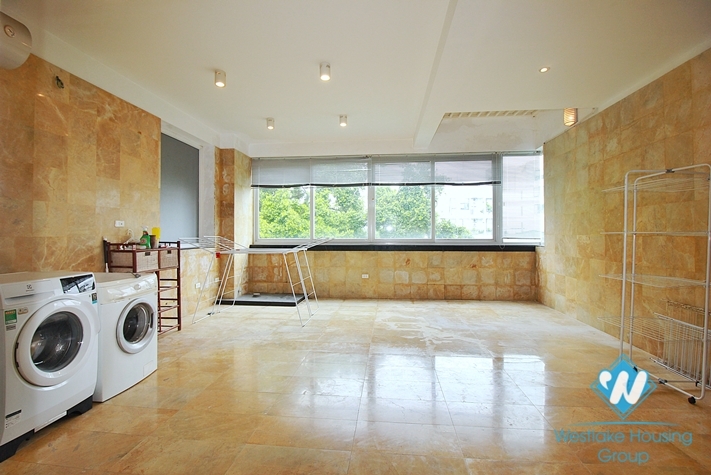 Semi-furnished 4 bedrooms house with big yard for rent in Tay Ho ward, Ha Noi