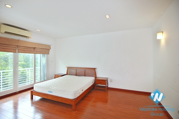 Semi-furnished 4 bedrooms house with big yard for rent in Tay Ho ward, Ha Noi