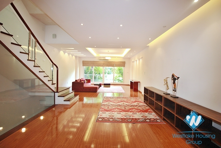 Semi-furnished 4 bedrooms house with big yard for rent in Tay Ho ward, Ha Noi