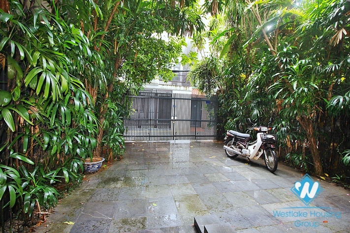 Semi-furnished 4 bedrooms house with big yard for rent in Tay Ho ward, Ha Noi