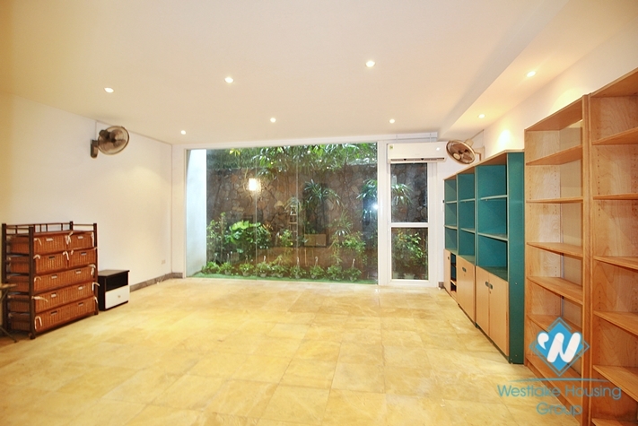 Semi-furnished 4 bedrooms house with big yard for rent in Tay Ho ward, Ha Noi